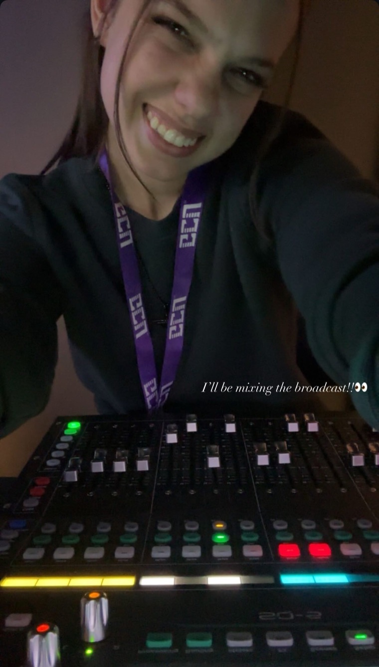 Raven Flaig at the sound board during a live production